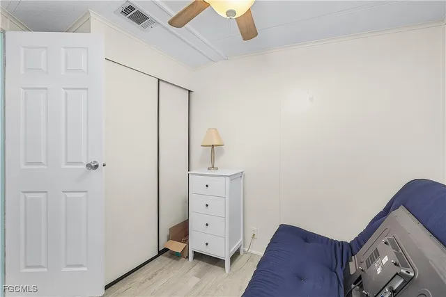 a room with a dresser