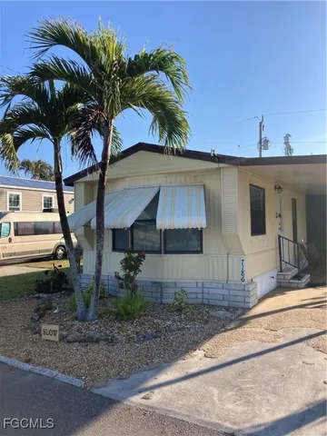 a view of a house with a patio