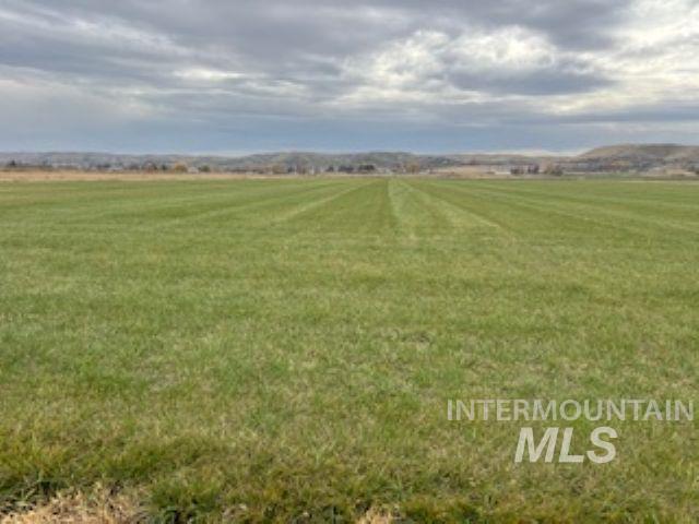 Tbd Little Rock Road Emmett, ID 83617 - Photo 7 of 26 Surrounding community featuring a view of countryside and a lawn
