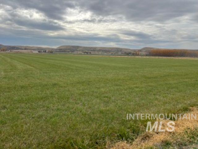 Tbd Little Rock Road Emmett, ID 83617 - Photo 8 of 26 View of green lawn featuring a view of rural / pastoral area