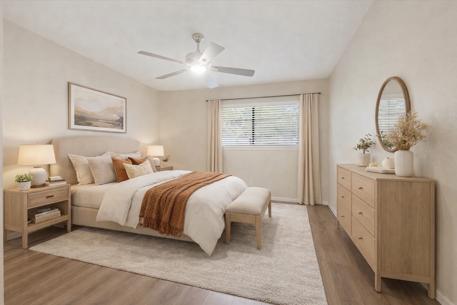 3502 Ocee Street, Unit 3502 Houston, TX 77063 - Photo 8 of 28 This is a bright, bedroom featuring neutral walls, wood-look flooring, a ceiling fan, and a window with blinds, offering a clean and versatile space. (Virtually Staged)