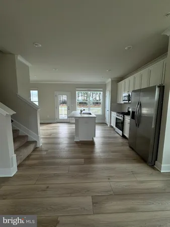 a view of kitchen and windows