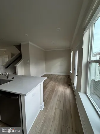 a view of a kitchen from the roof deck