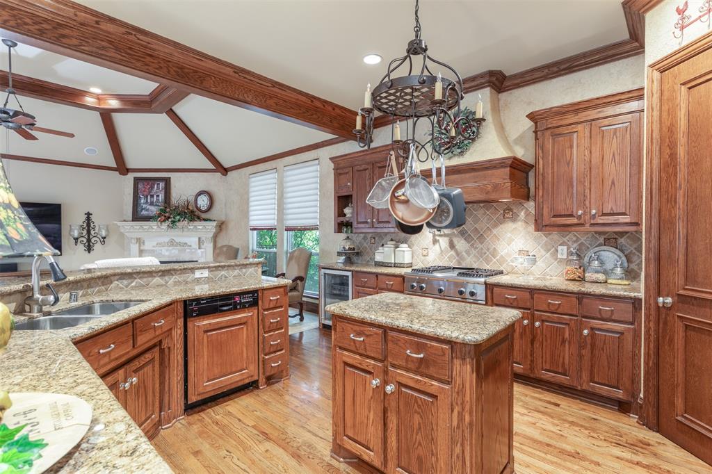 3401 Francesca Court Rowlett, TX 75088 - Photo 3 of 13 a kitchen with a sink and cabinets