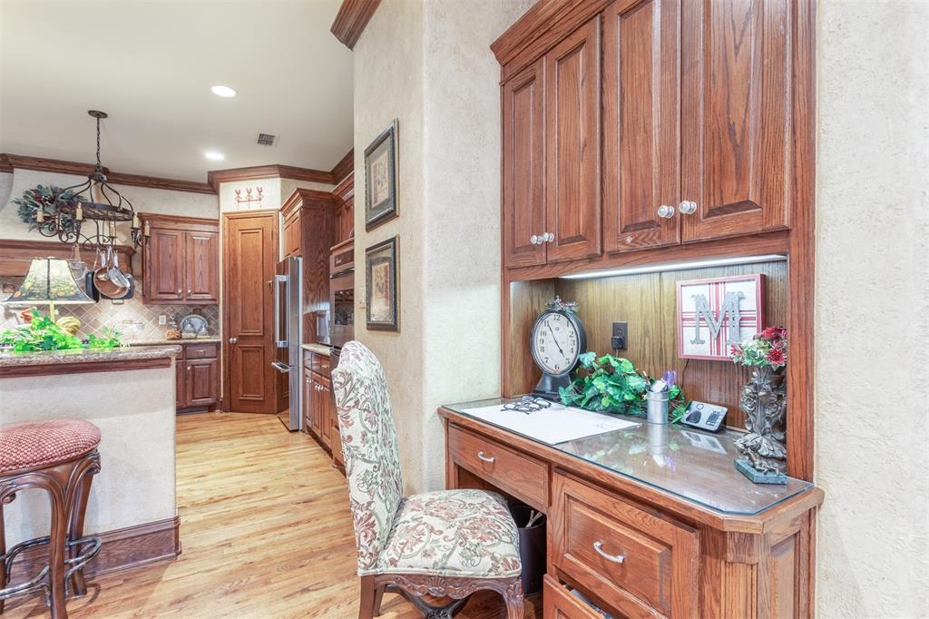 3401 Francesca Court Rowlett, TX 75088 - Photo 9 of 13 a dining room with furniture and a chandelier
