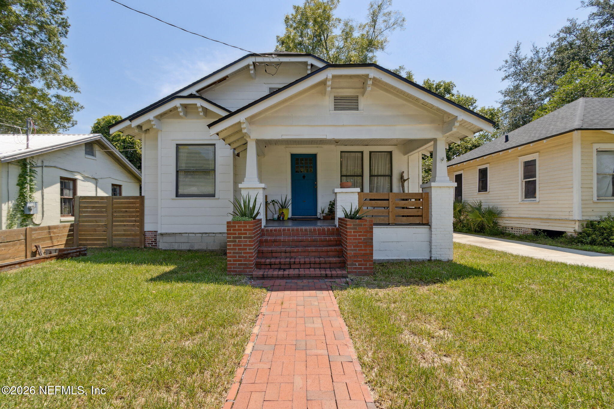 2974 Gilmore Street Jacksonville, FL 32205 - Photo 1 of 28 a front view of a house with a yard