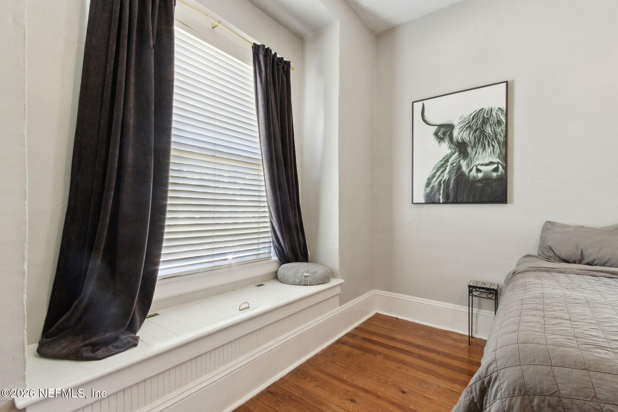 2974 Gilmore Street Jacksonville, FL 32205 - Photo 17 of 28 a bedroom with a bed and a window