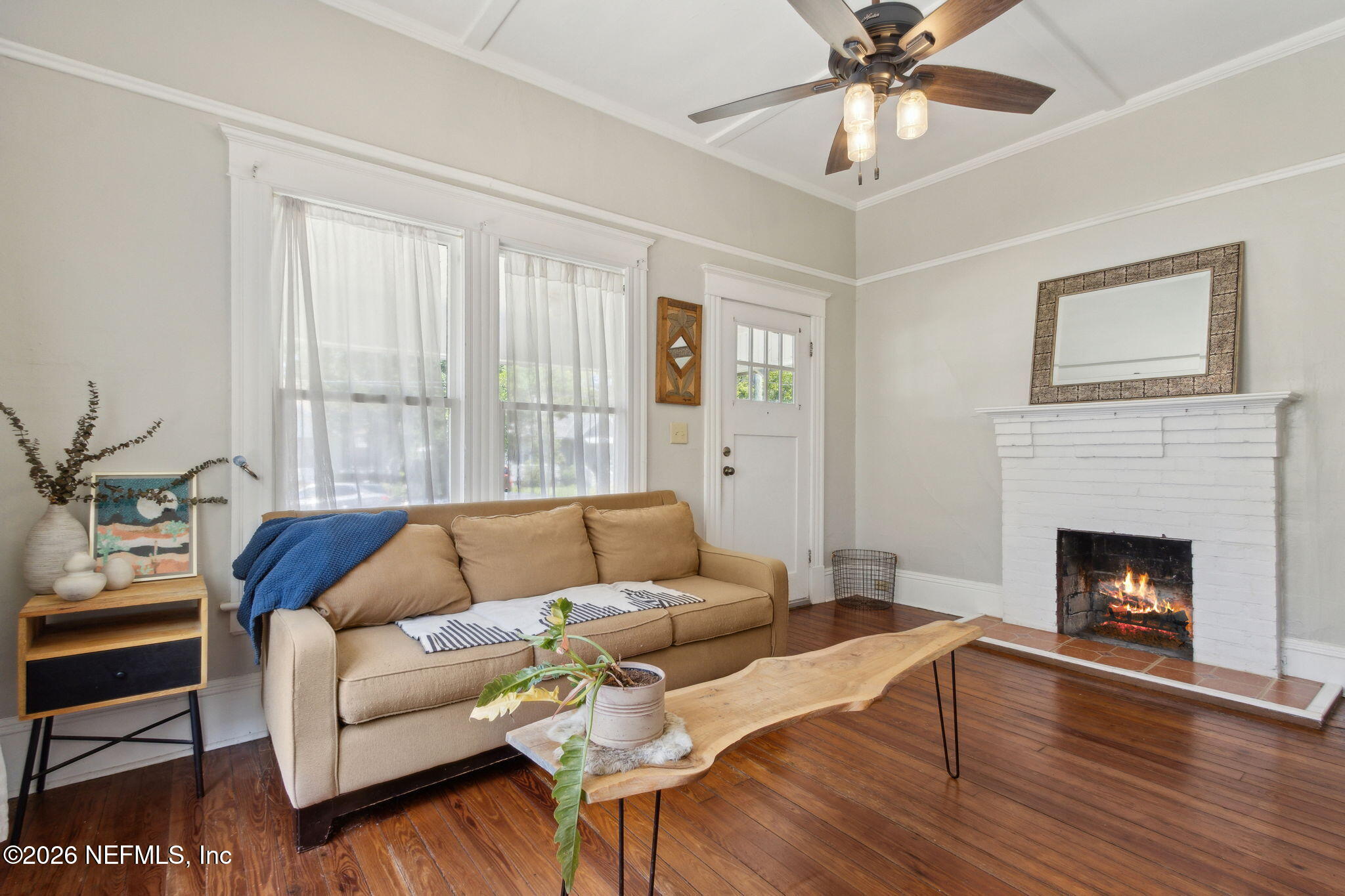 2974 Gilmore Street Jacksonville, FL 32205 - Photo 5 of 28 a living room with furniture and a fireplace