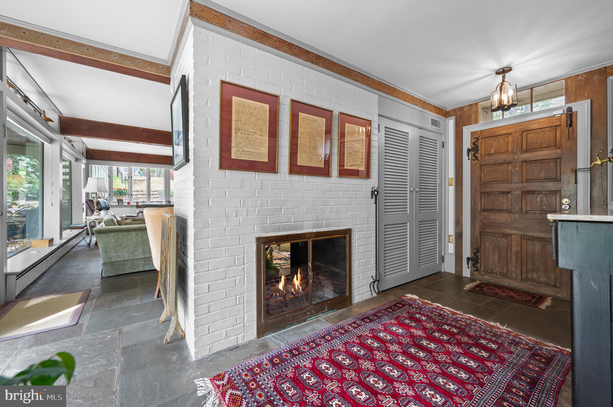 561 Upper Pike Creek Road Newark, DE 19711 - Photo 6 of 36 Foyer with 2 Sided Fireplace to Family Room