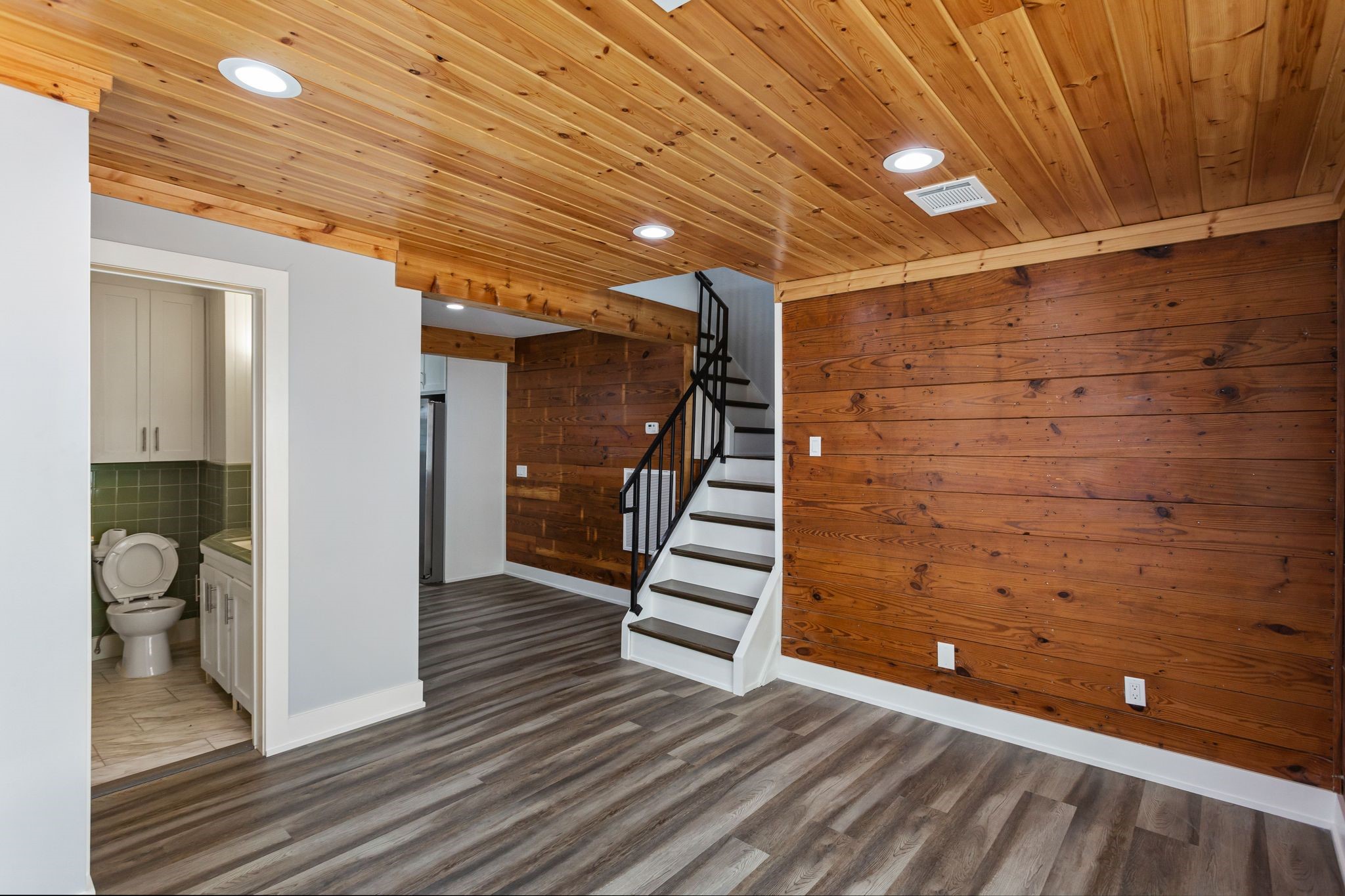 2005 Portsmouth Street, Unit B Houston, TX 77098 - Photo 10 of 24 a view of entryway with stairs and wooden floor