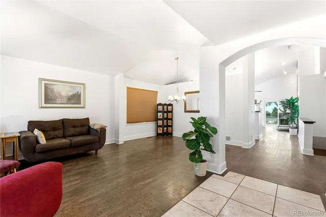 a living room with furniture and a couch