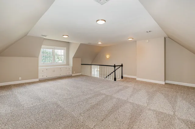 a view of yard from deck having patio