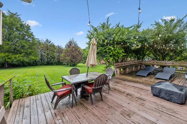 a view of a balcony with chairs