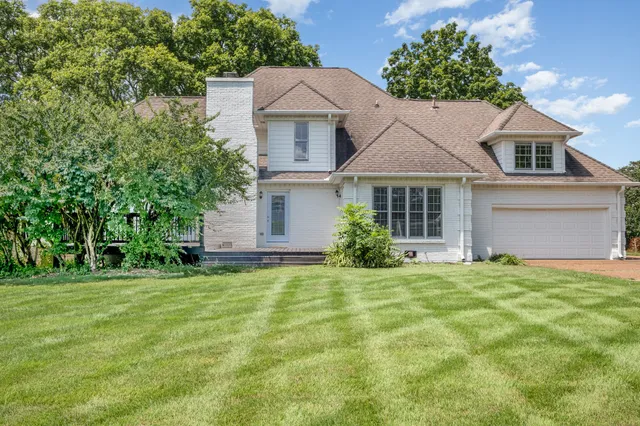 a view of a house with a park