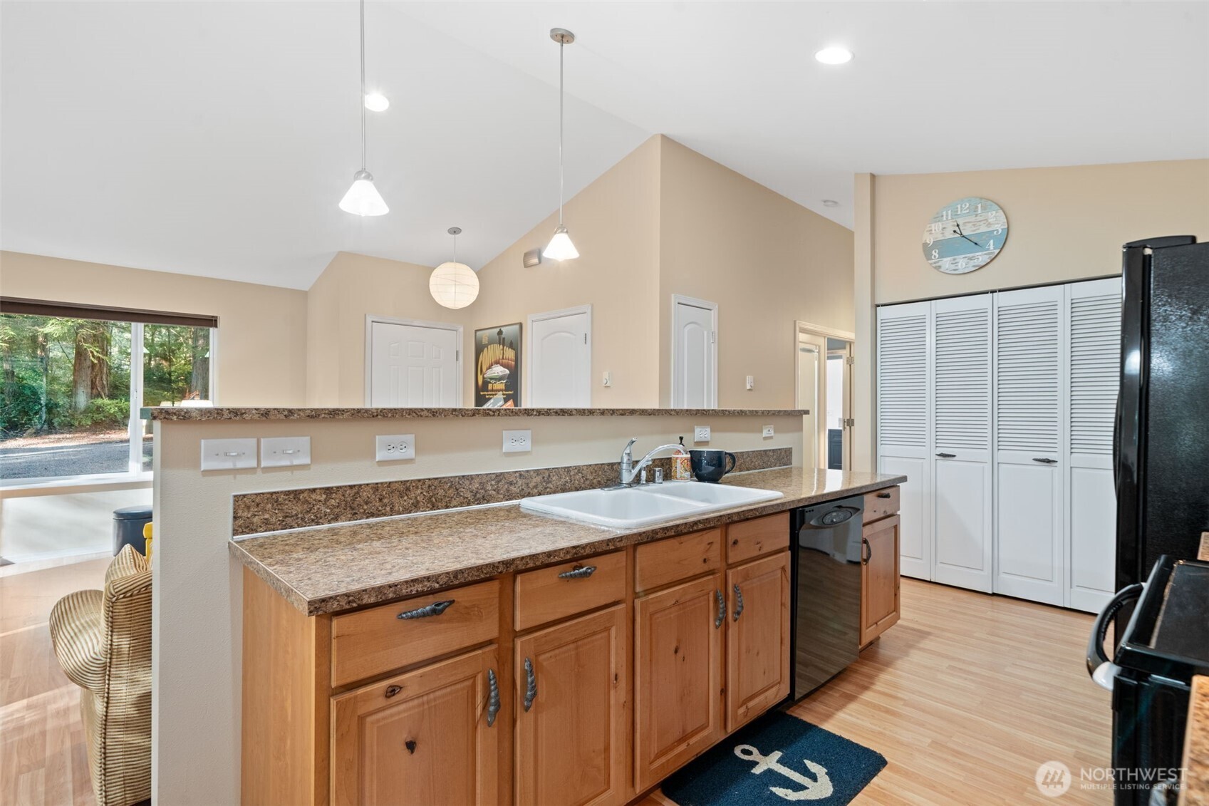 664 East Portage Road Shelton, WA 98584 - Photo 15 of 40 a kitchen with a sink a counter space and appliances