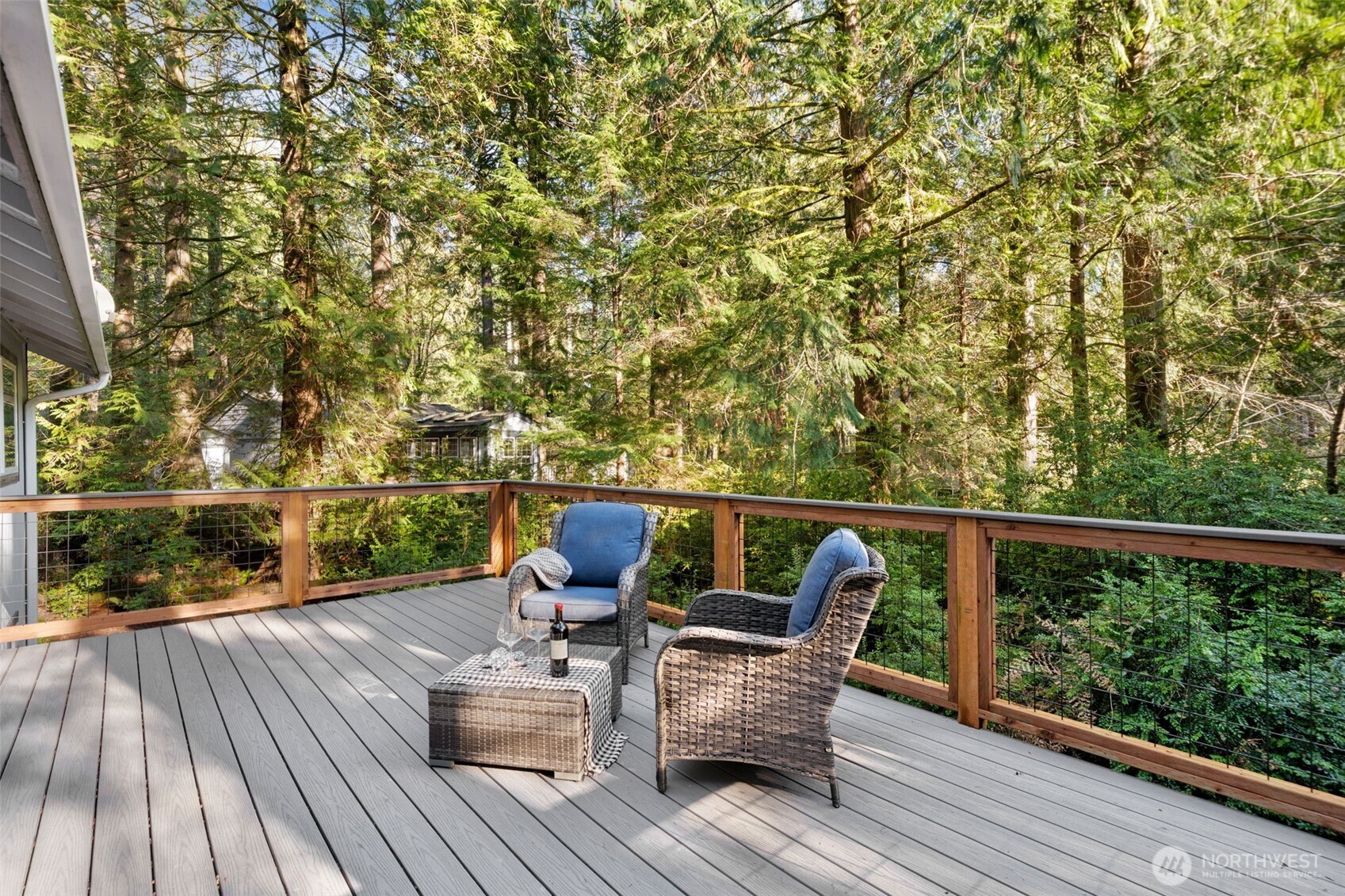 664 East Portage Road Shelton, WA 98584 - Photo 20 of 40 a view of balcony with furniture and wooden floor
