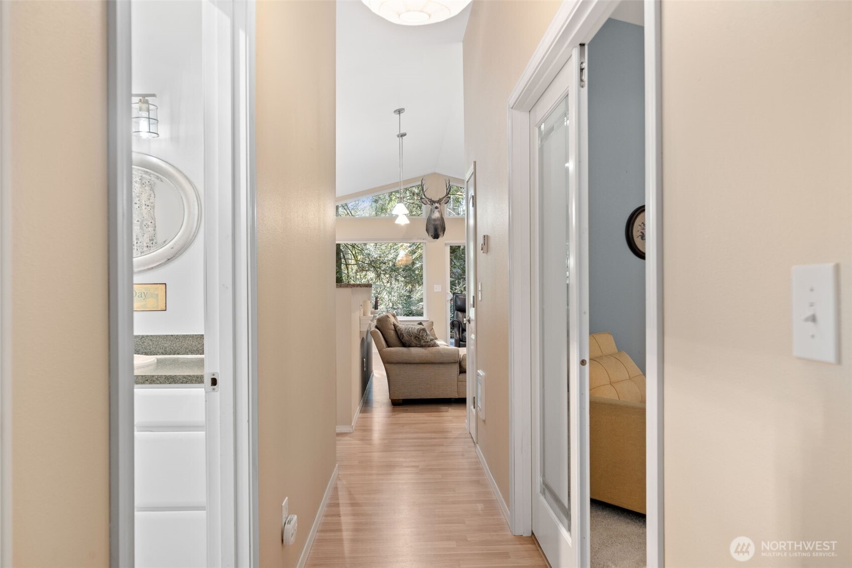 664 East Portage Road Shelton, WA 98584 - Photo 27 of 40 a view of a hallway with livingroom and furniture