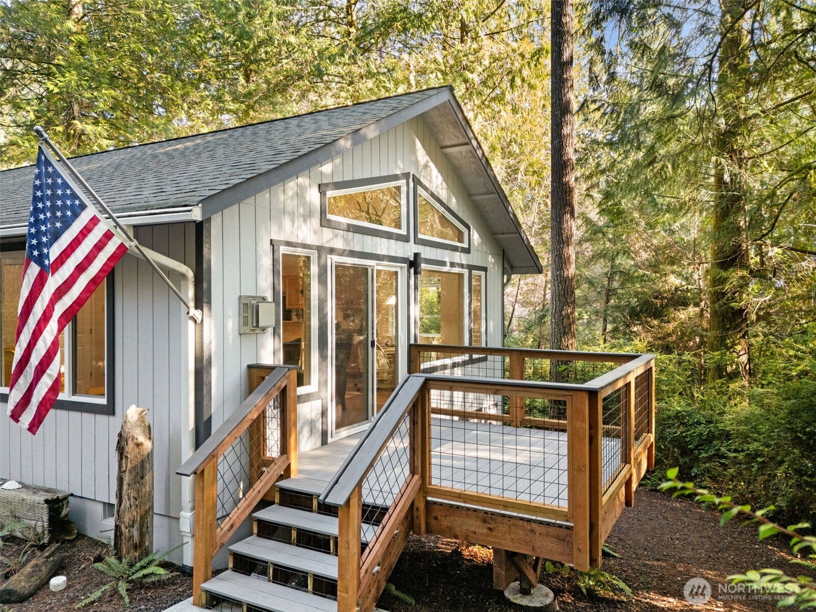 664 East Portage Road Shelton, WA 98584 - Photo 31 of 40 a front view of a house with a yard