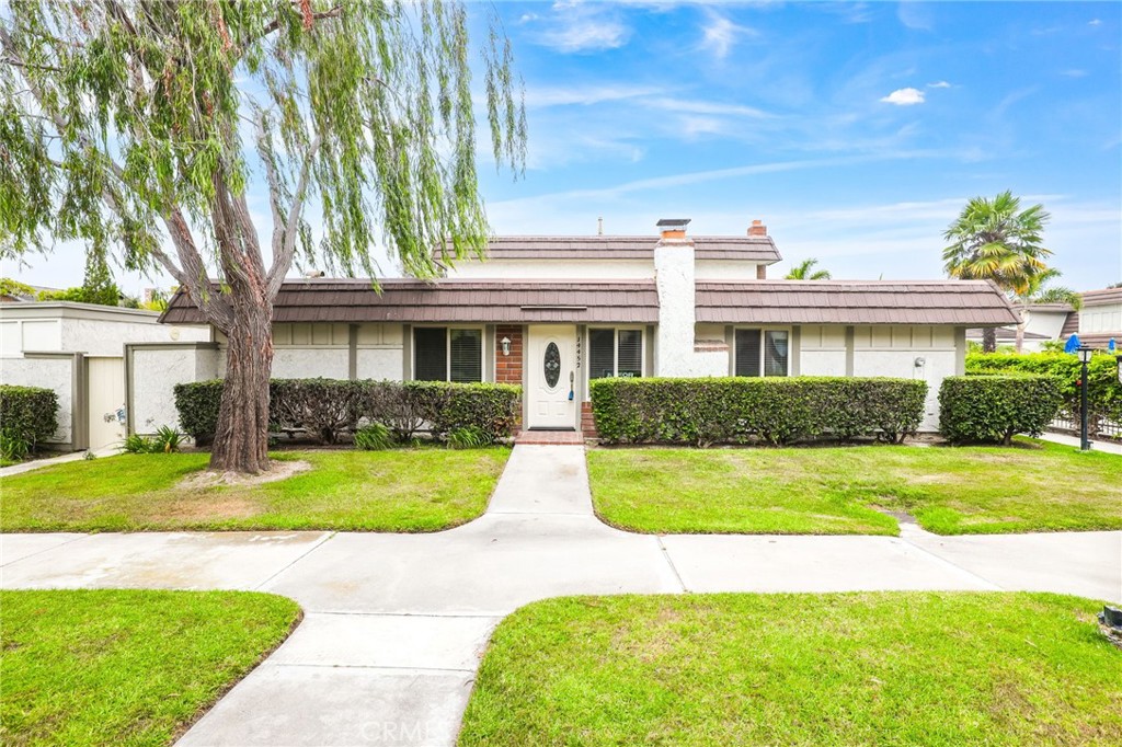 14452 Pimlico Road Westminster, CA 92683 - Photo 44 of 45 front view of a house next to a yard
