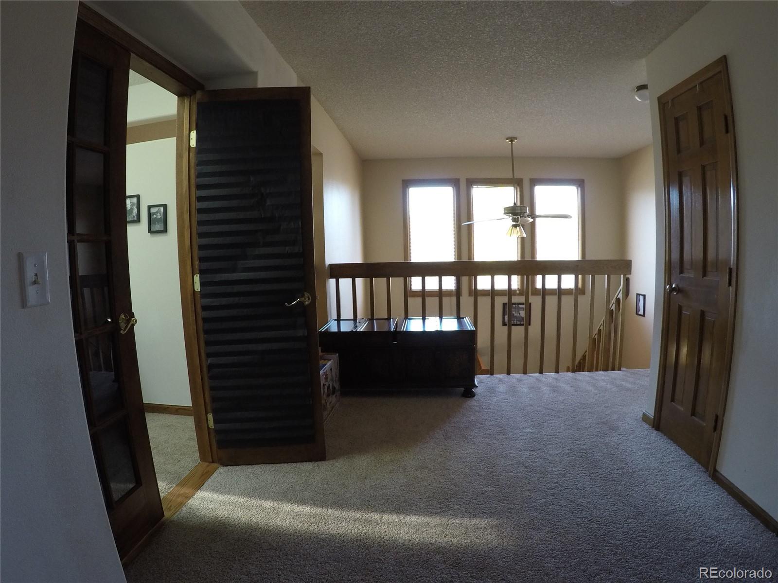 8148 Sweet Water Road Lone Tree, CO 80124 - Photo 10 of 13 a view of balcony with furniture