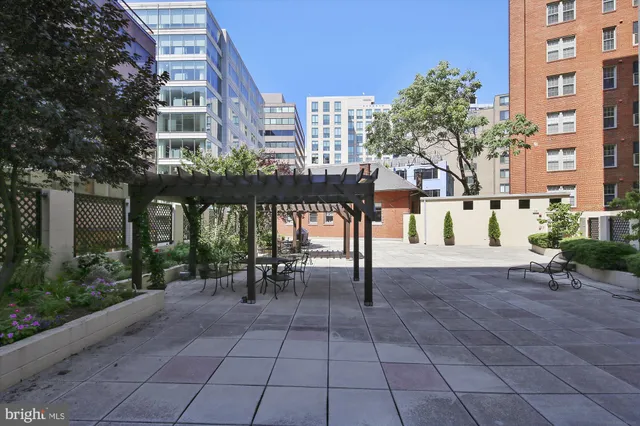 a view of a chairs and tables in the patio