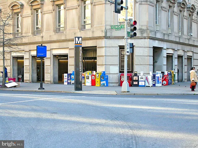 a view of a patio with couches table and chairs and potted plants