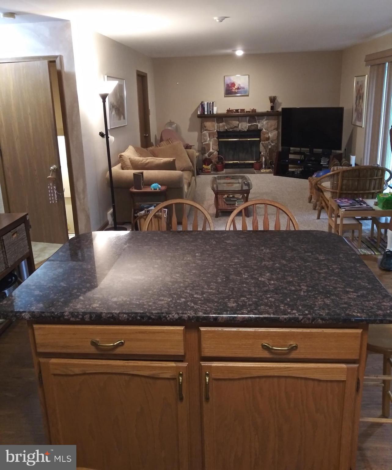 7753 Mellon Road Wyncote, PA 19095 - Photo 14 of 48 Kitchen Island and Family Room