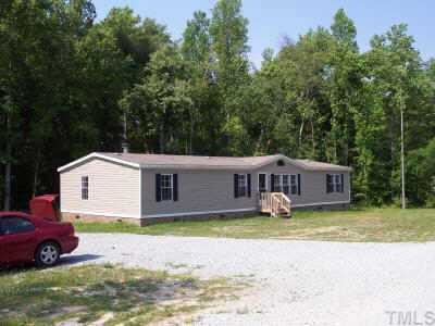 105 Renegade Lane Roxboro, NC 27574 - Photo 1 of 1 a view of a house with a yard and large trees