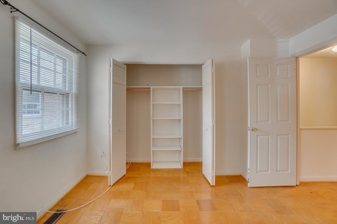 431 Greenbrier Ct., Unit 431 Fredericksburg, VA 22401 - Photo 31 of 49 bedroom with closet and built in shelving