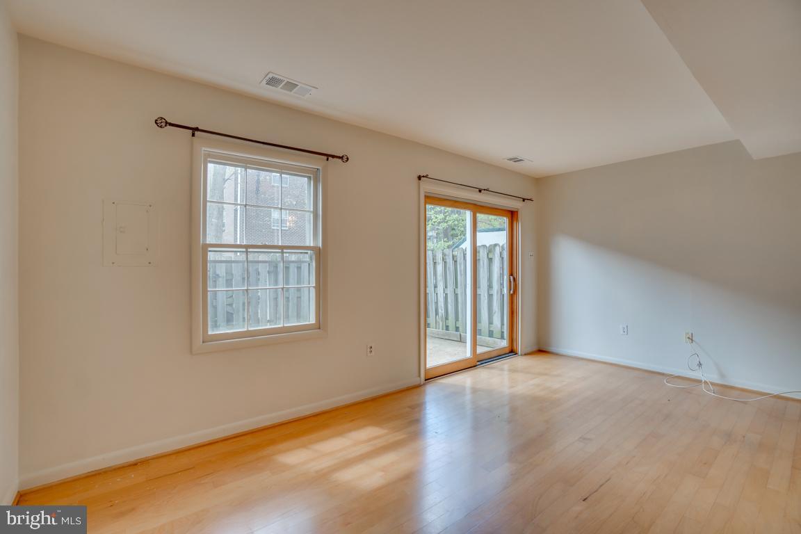 431 Greenbrier Ct., Unit 431 Fredericksburg, VA 22401 - Photo 36 of 49 Sliding doors to patio