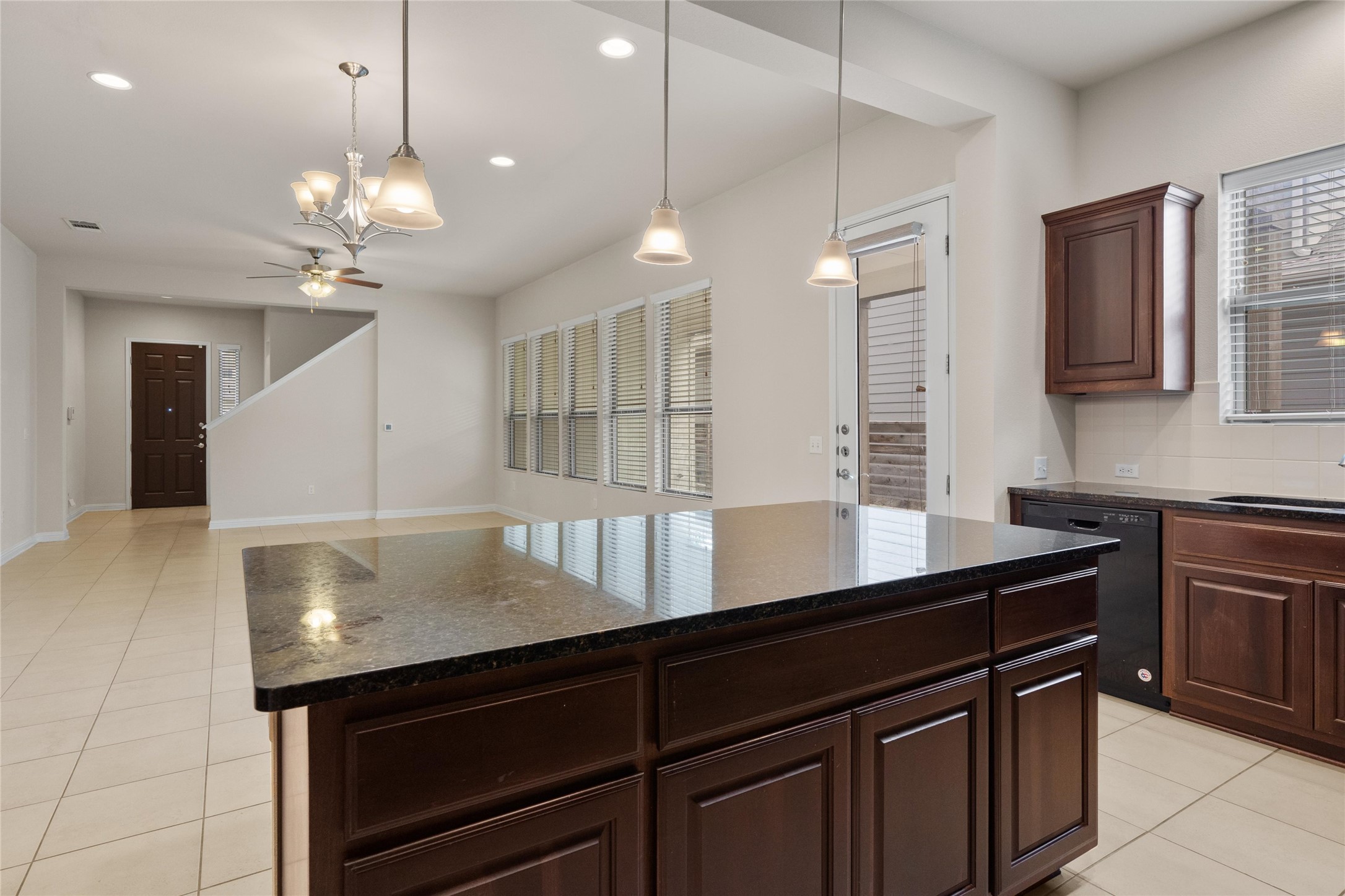 6907 Idea Road Austin, TX 78741 - Photo 10 of 36 a kitchen with a sink a counter space cabinets and appliances