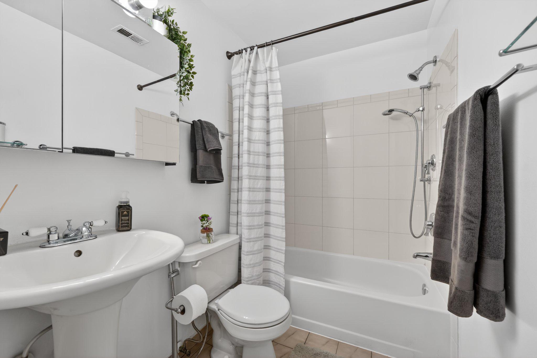 1107 Harvard Street Northwest, Unit R Washington, DC 20009 - Photo 10 of 20 Modern Bathroom with sleek finishes.