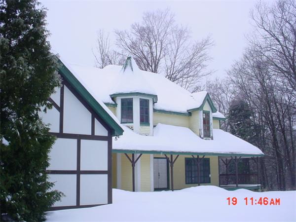 4 County Road Huntington, MA 01050 - Photo 1 of 1 a front view of a house with garden