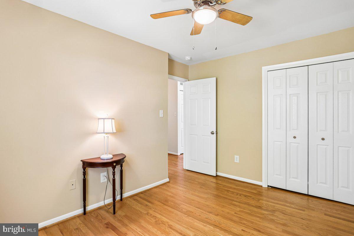 76 Timber Rock Road Gaithersburg, MD 20878 - Photo 28 of 51 a view of an empty room with wooden floor