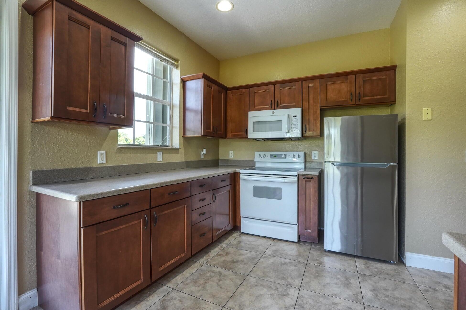 1550 C Road Loxahatchee Groves, FL 33470 - Photo 5 of 23 1550 C Rd kitchen 2
