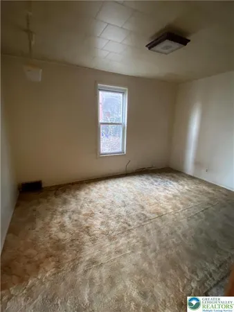 an empty room with a window