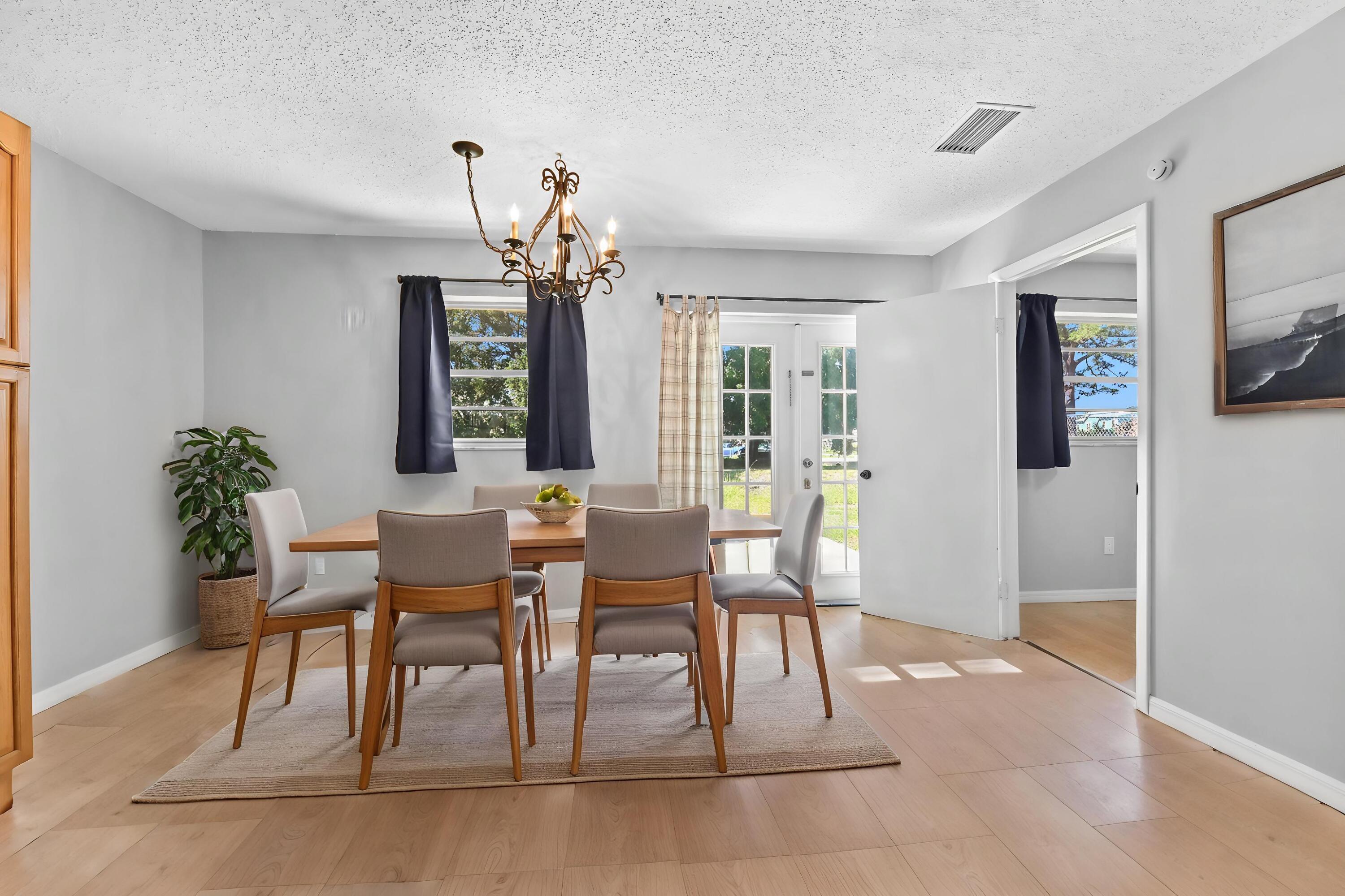 4548 Southeast Salvatori Road Stuart, FL 34997 - Photo 10 of 30 07-Dining-room-01_VS