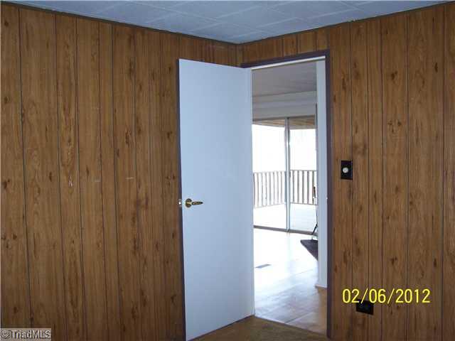 3802 Amostown Road Sandy Ridge, NC 27046 - Photo 13 of 16 1st Bedroom.