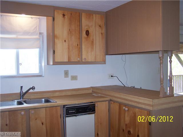 3802 Amostown Road Sandy Ridge, NC 27046 - Photo 7 of 16 Kitchen. with dishwasher & refrigerator