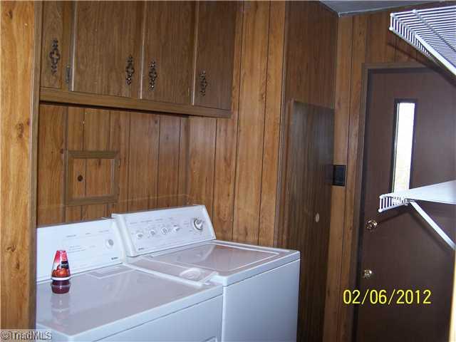 3802 Amostown Road Sandy Ridge, NC 27046 - Photo 9 of 16 Laundry Room. Includes washer & dryer
