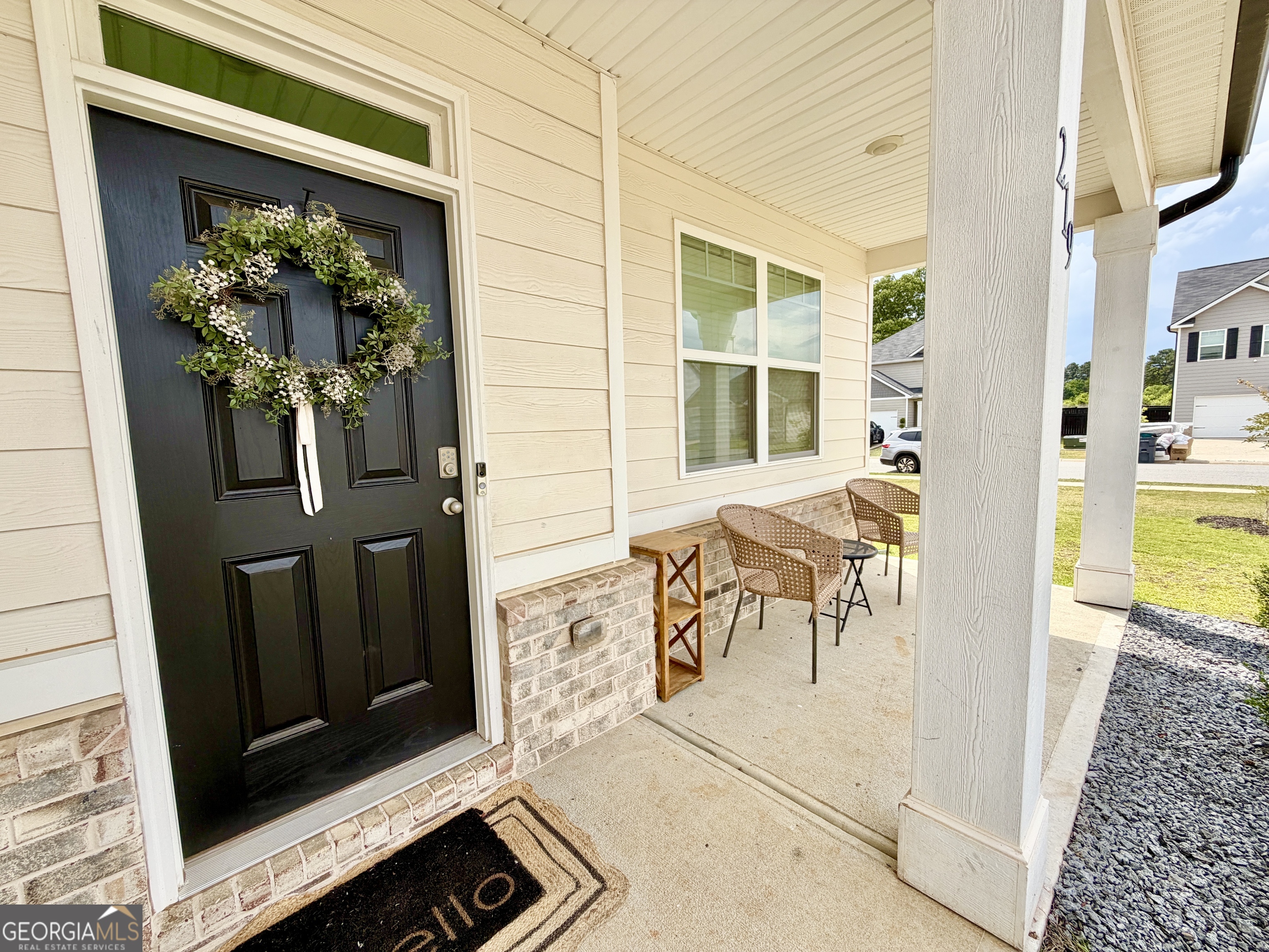 219 Barnyard Way Perry, GA 31069 - Photo 3 of 44 image of a entryway door of the house and living room