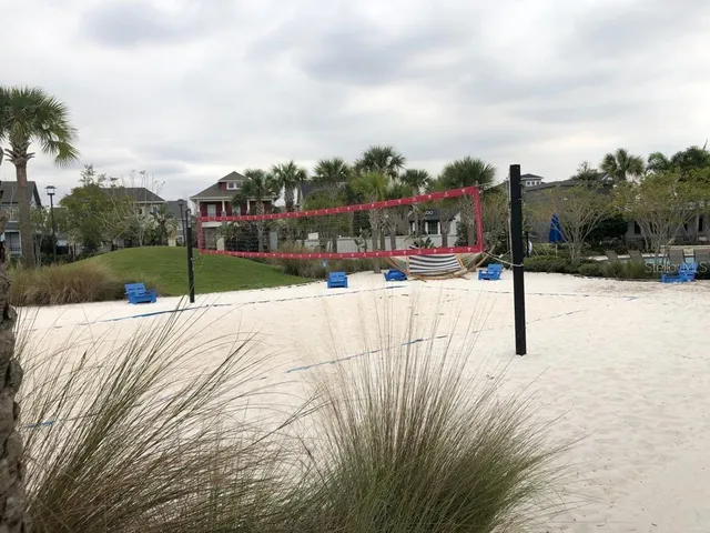 a view of swimming pool with outdoor seating and yard