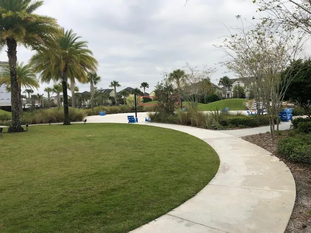 a view of street with parked cars