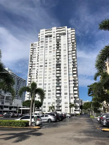 a front view of a building with street view