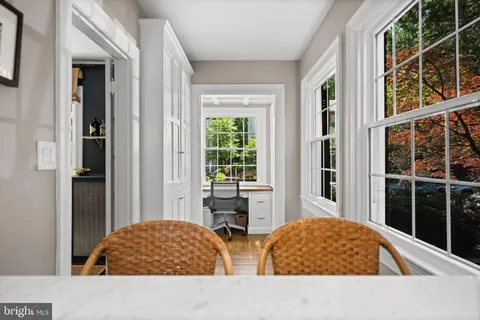 a view of entryway with wooden floor