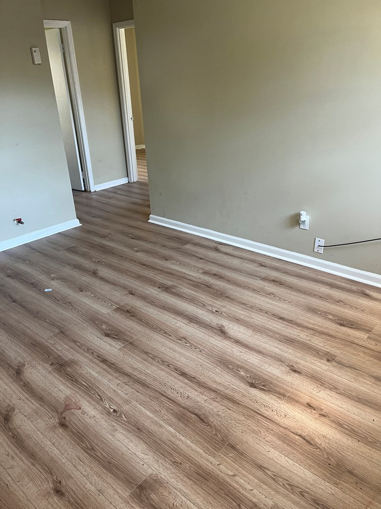 1422 23rd Street, Unit A Columbus, GA 31901 - Photo 2 of 8 a view of a closet with wooden floor