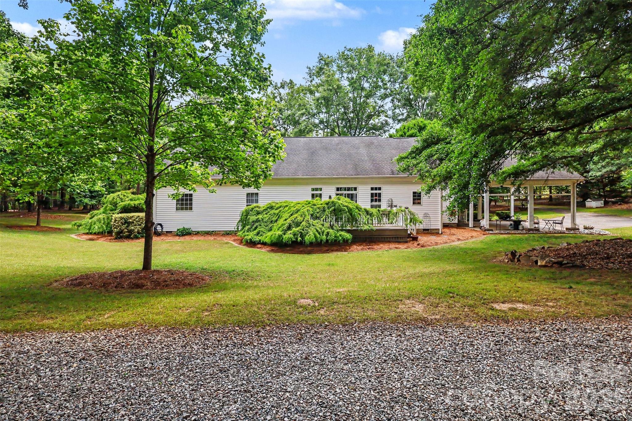 4037 Old Williamston Road Belton, SC 29627 - Photo 27 of 41 a front view of a house with a yard
