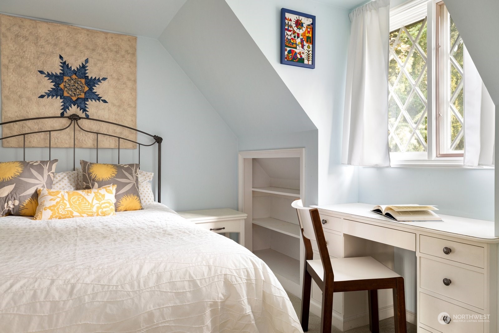 15253 Josh Wilson Road Burlington, WA 98233 - Photo 14 of 40 a bedroom with a bed and a table chair