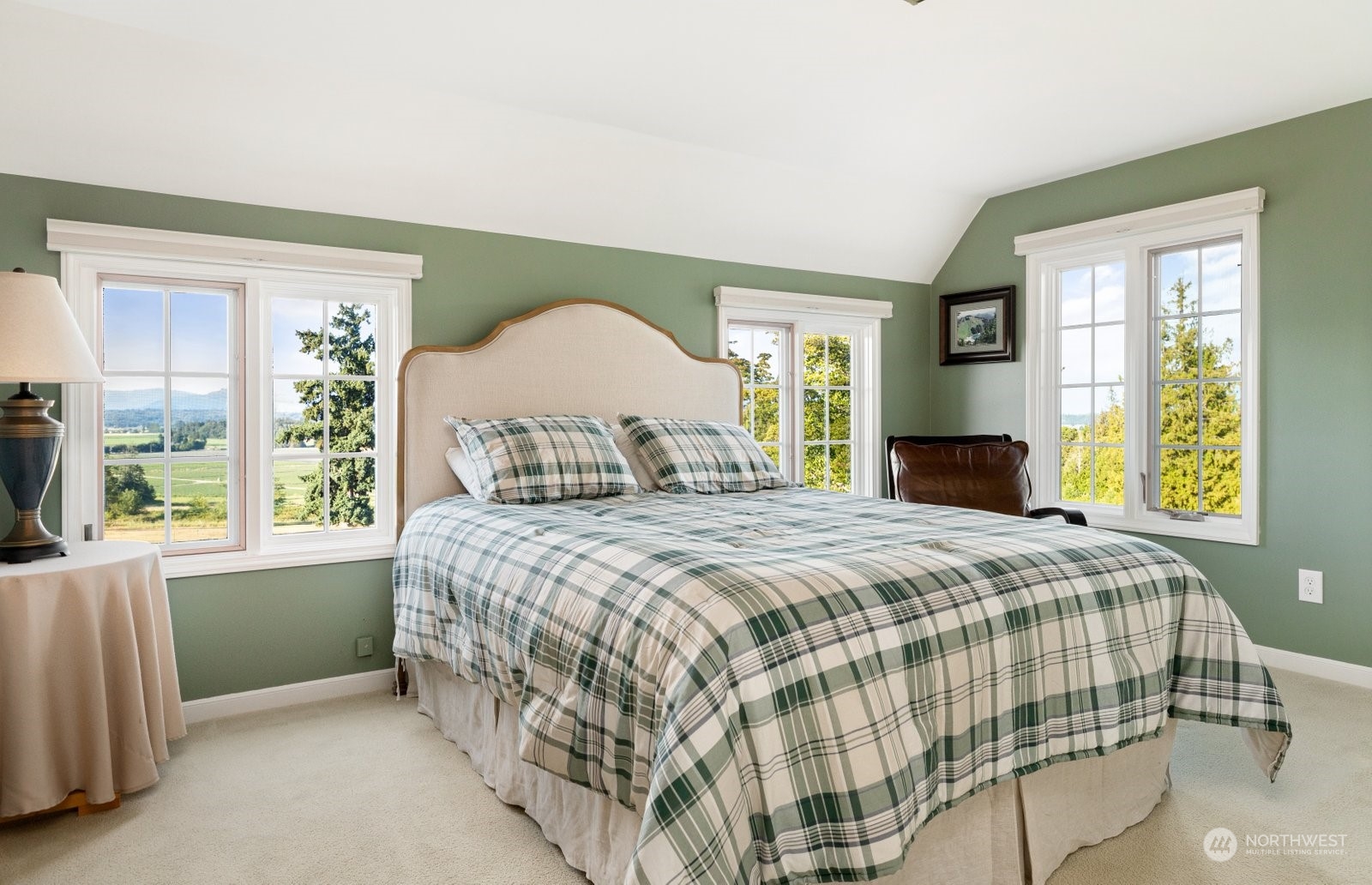 15253 Josh Wilson Road Burlington, WA 98233 - Photo 16 of 40 a bedroom with a bed and a large window