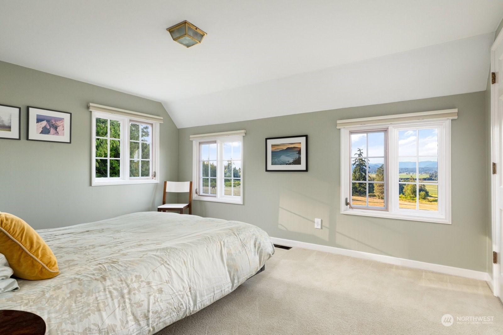 15253 Josh Wilson Road Burlington, WA 98233 - Photo 17 of 40 a bedroom with a bed and a window